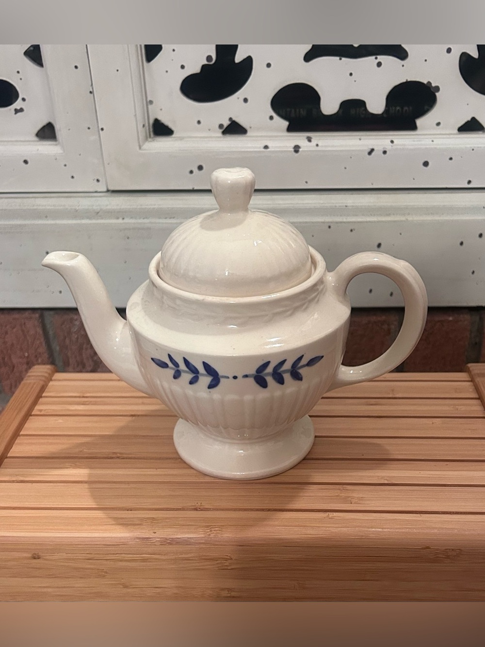 White Ceramic Teapot with Blue Leaf Motif